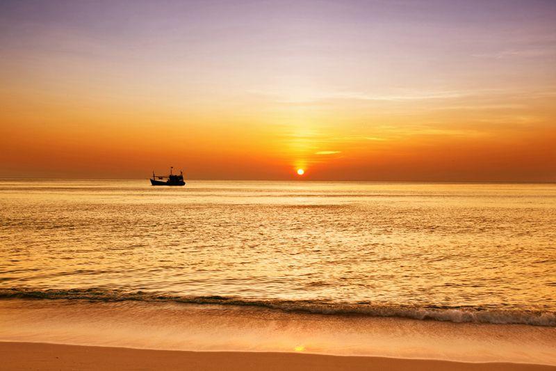 Carta da parati Tramonto tropicale con barca