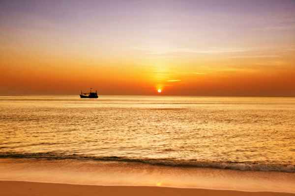 Carta da parati Tramonto tropicale con barca