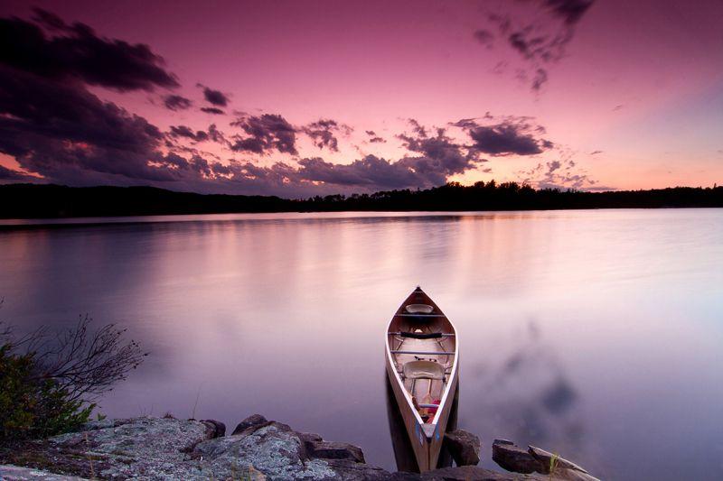 Carta da parati Tramonto con canoa